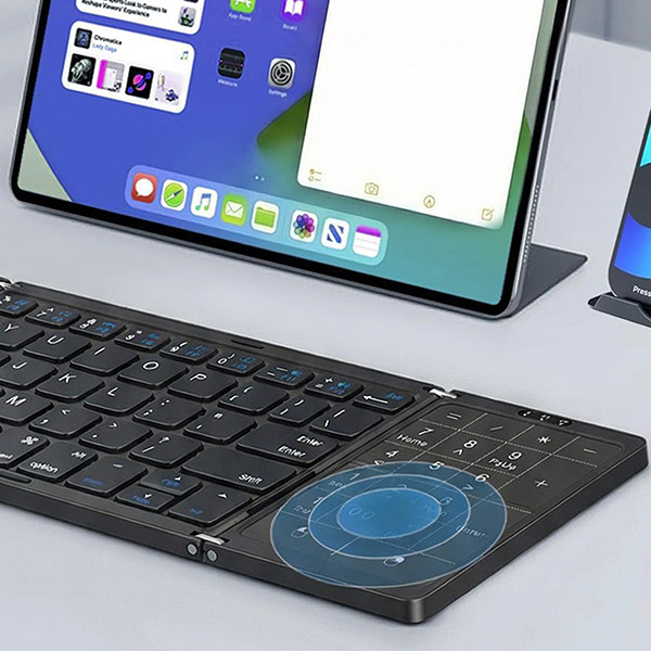Porodo Slim Folding Keyboard with Integrated Numpad & Touchpad - Black - mobile shop in Hamra, Beirut, Lebanon. New and used phones, iPhone, Samsung, Huawei, Xiaomi, Oppo, Realme, Honor, Google Pixel, tablets, laptops, computers, and accessories. متجر موبايلات في الحمرا، بيروت، لبنان. هواتف جديدة ومستعملة، آيفون، سامسونج، هواوي، شاومي، أوبو، ريلمي، هونر، جوجل بيكسل، أجهزة لوحية، لابتوبات، كمبيوترات، واكسسوارات.